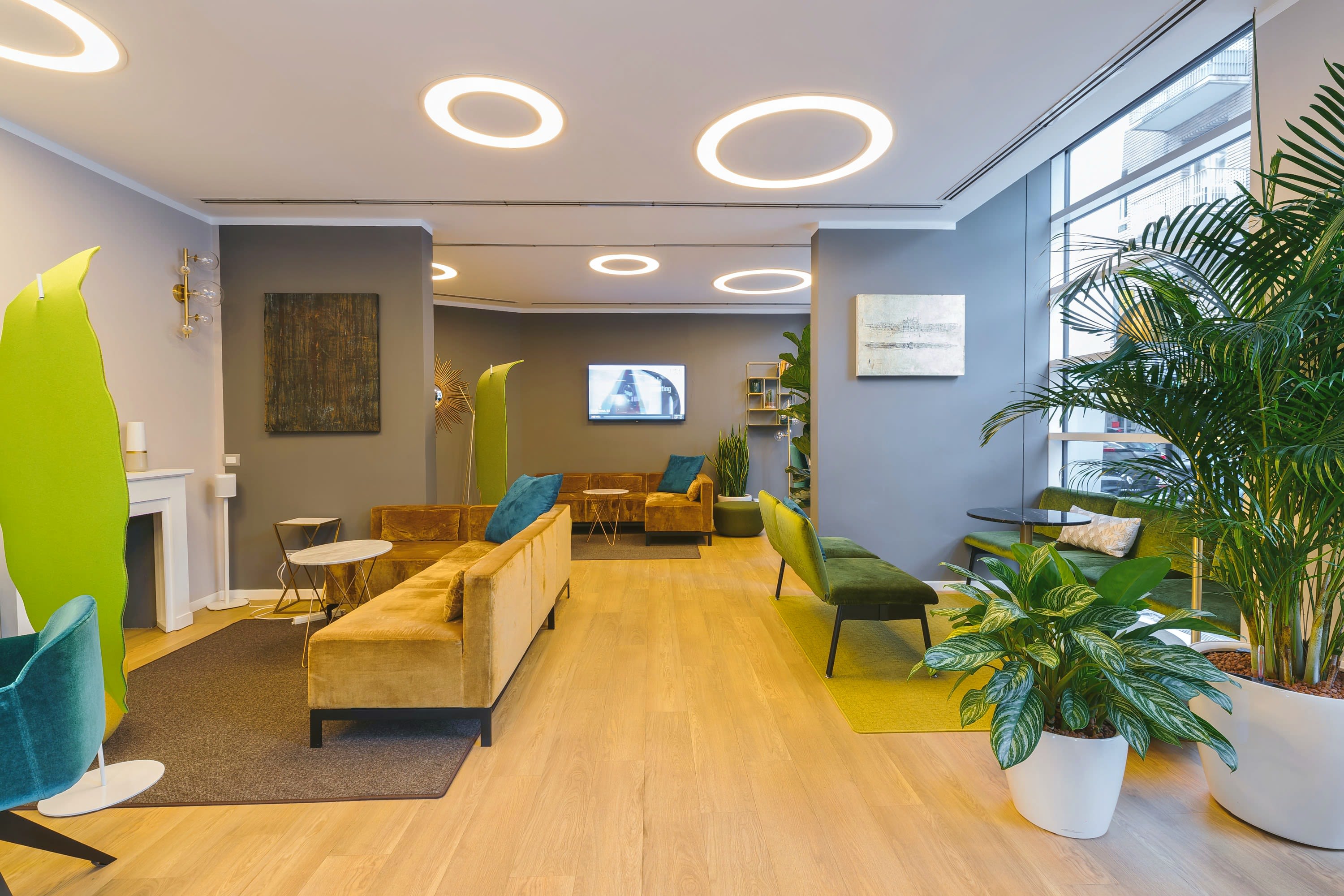 brown wooden table near green plant