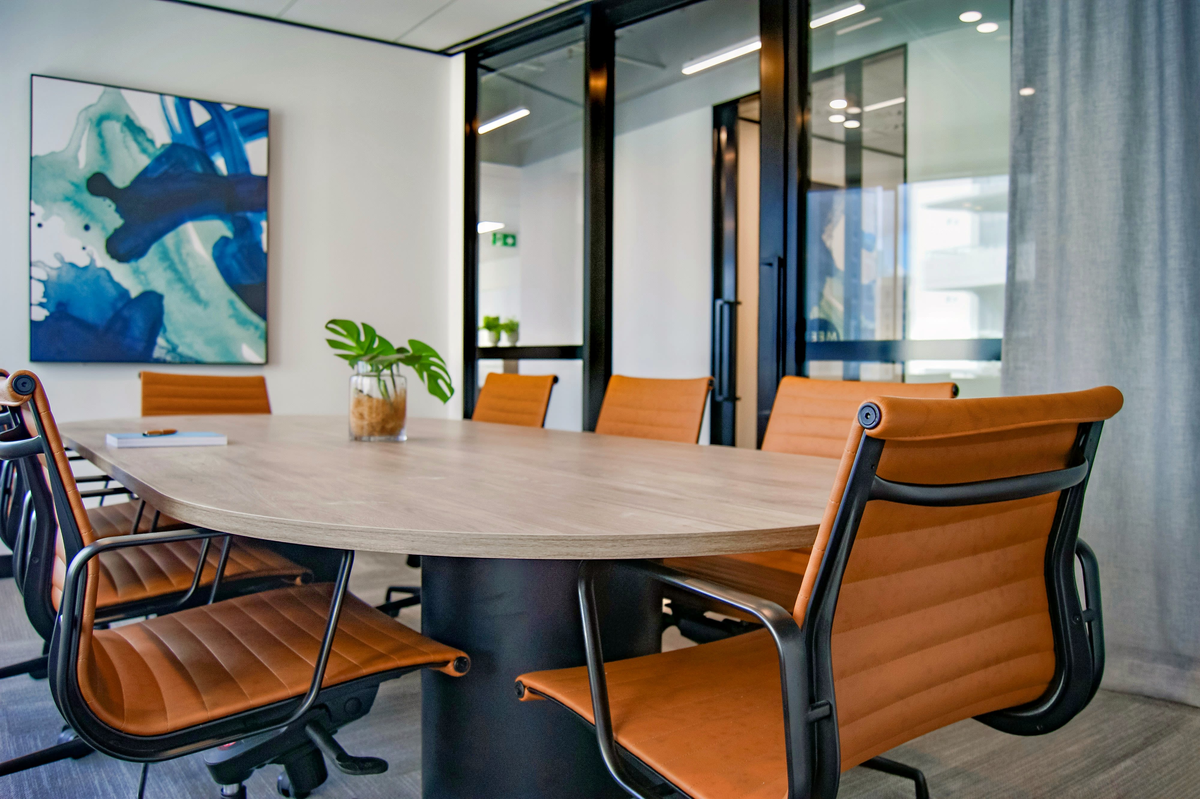 brown wooden 9-piece office table and chairs